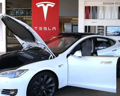 Автомобили Tesla стали продаваться за криптовалюту